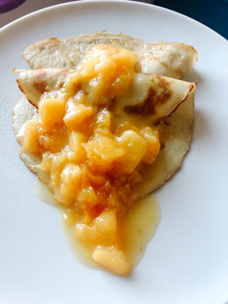 Crepes with peach & lime zeste compote