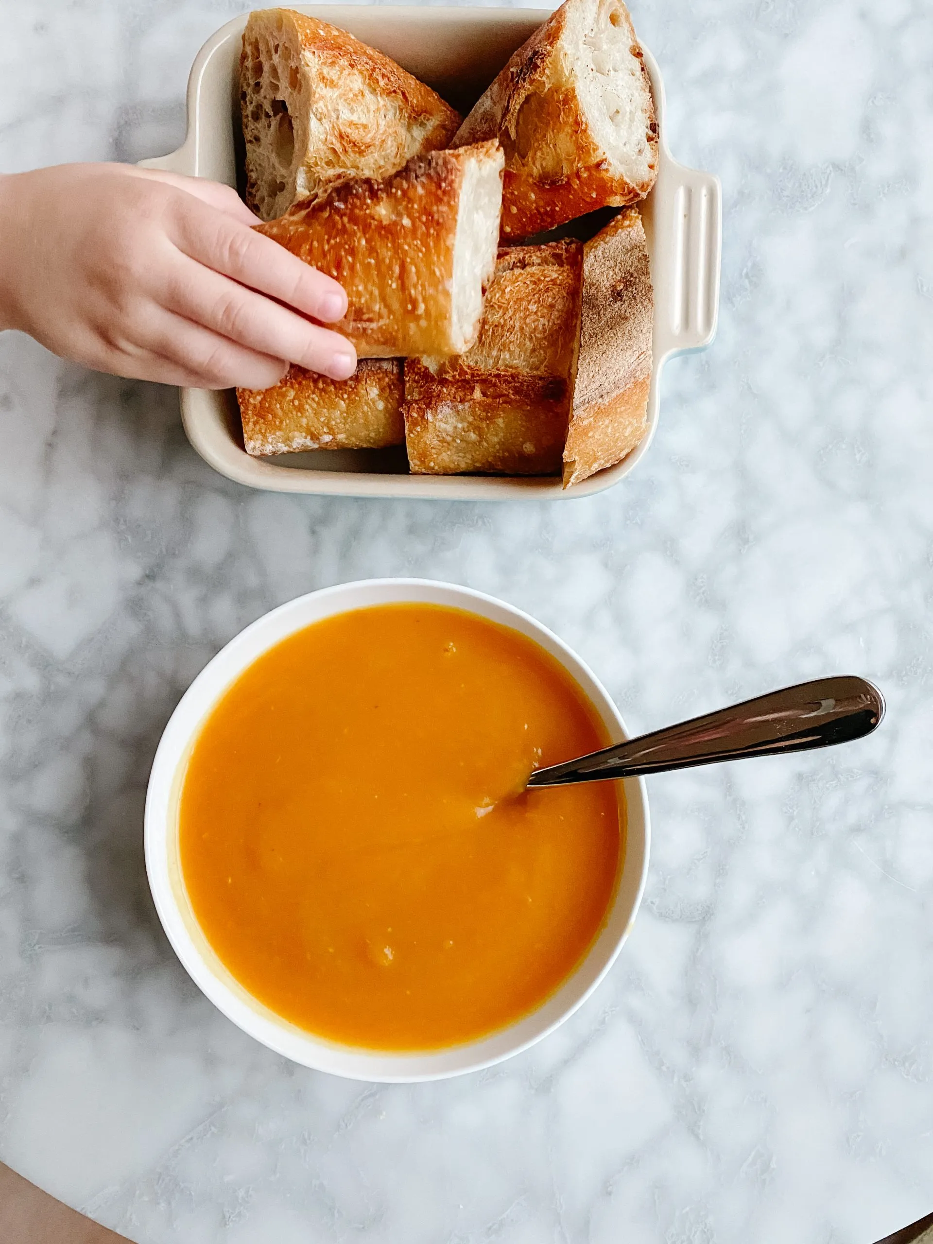 Pumpkin and honeynut squash soup with freshly made baguette