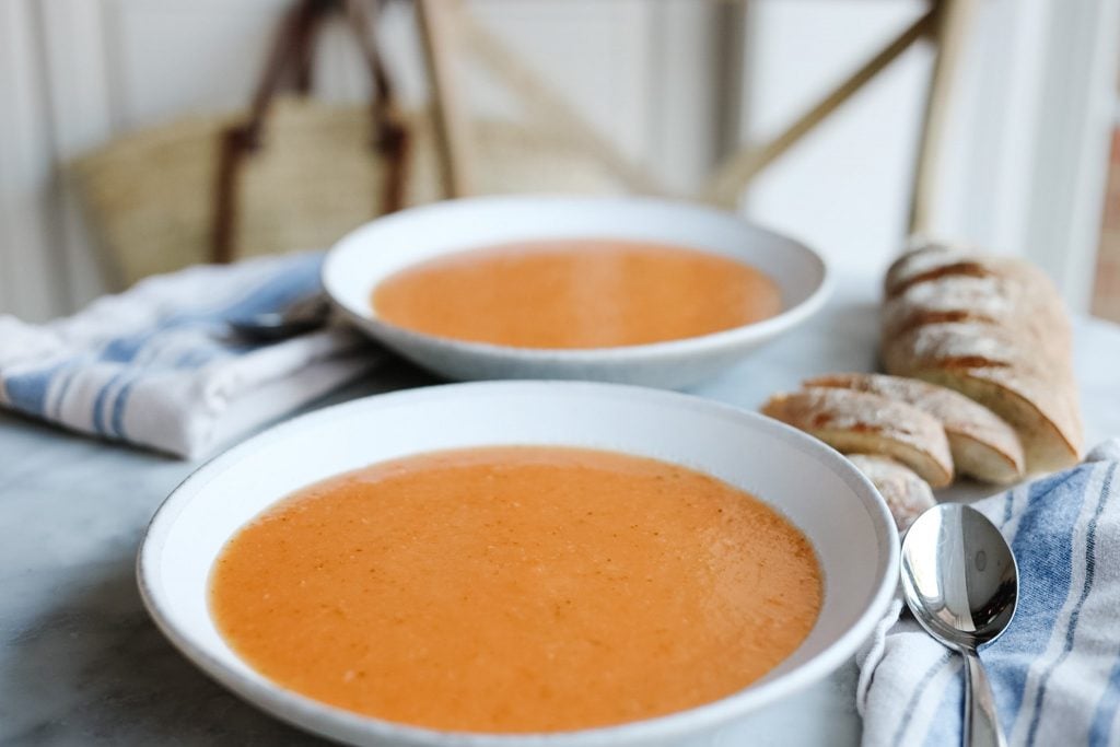 la Soupe de Mamie vegetable soup in two bowls with a baguette