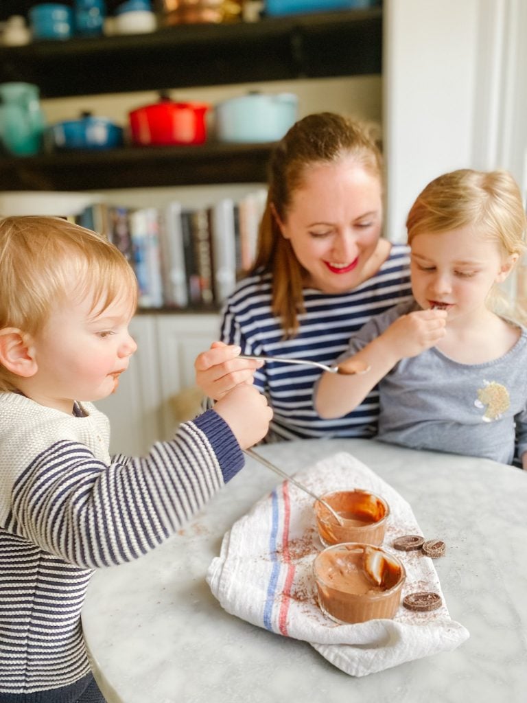 Le Chef's wife in her kitchen with her 2 kids eating chocolate mousse