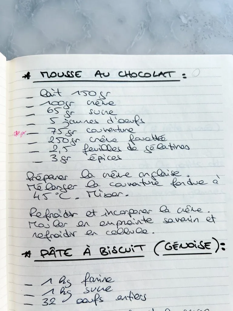 Le Chef Sébastien's notebook with his handwritten recipe for French chocolate Mousse