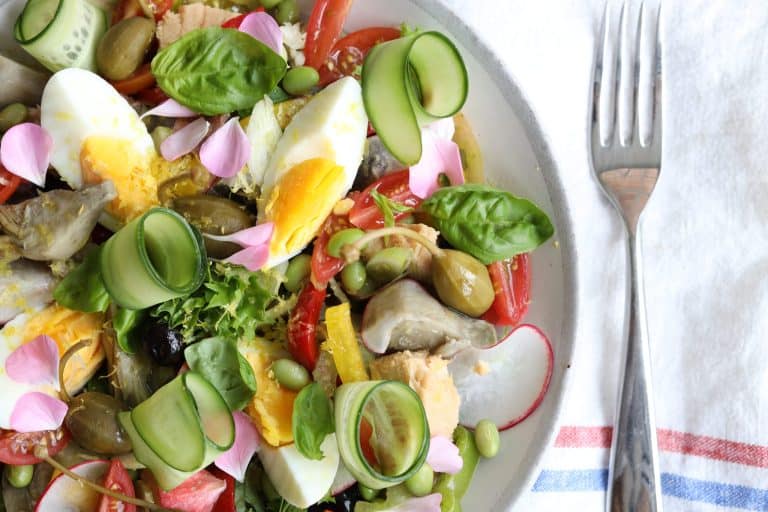 Nicoise salad - tomatoes, artichokes, capers, cucumbers olives and capers with tuna