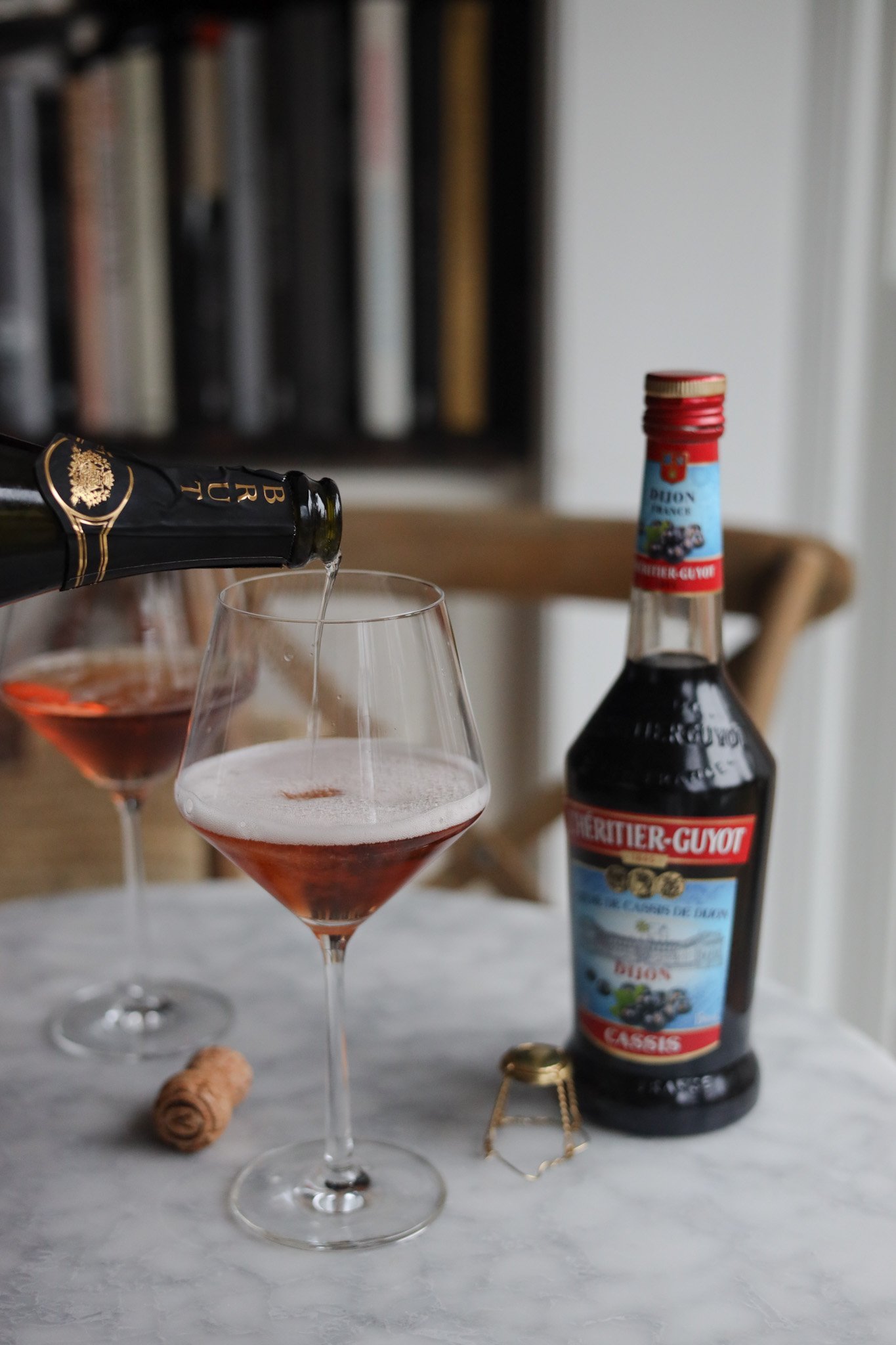 creme de cassis and champagne to make a kir royale cocktail