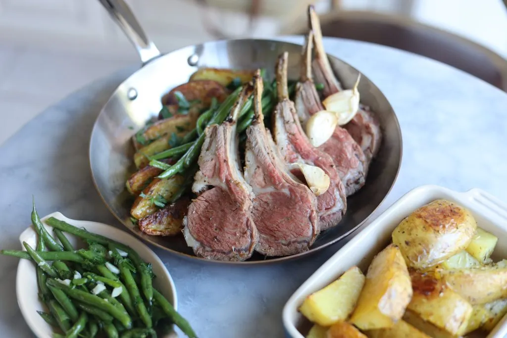 roast rack of lamb with potatoes and green beans