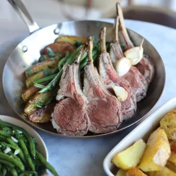 roast rack of lamb with potatoes and green beans