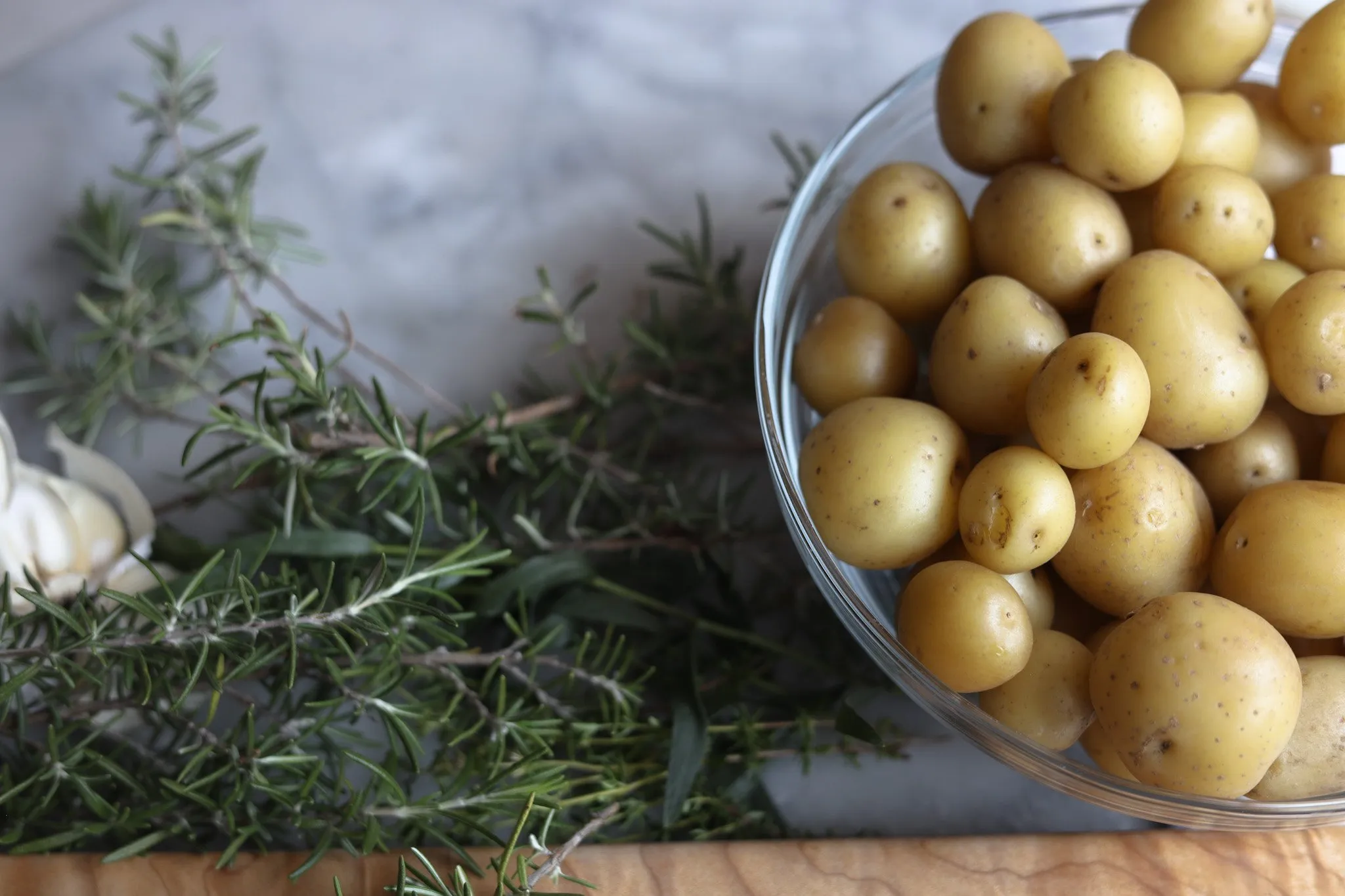 mini yellow potatoes and fresh herbs
