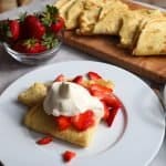 Chantilly cream over strawberry crepes