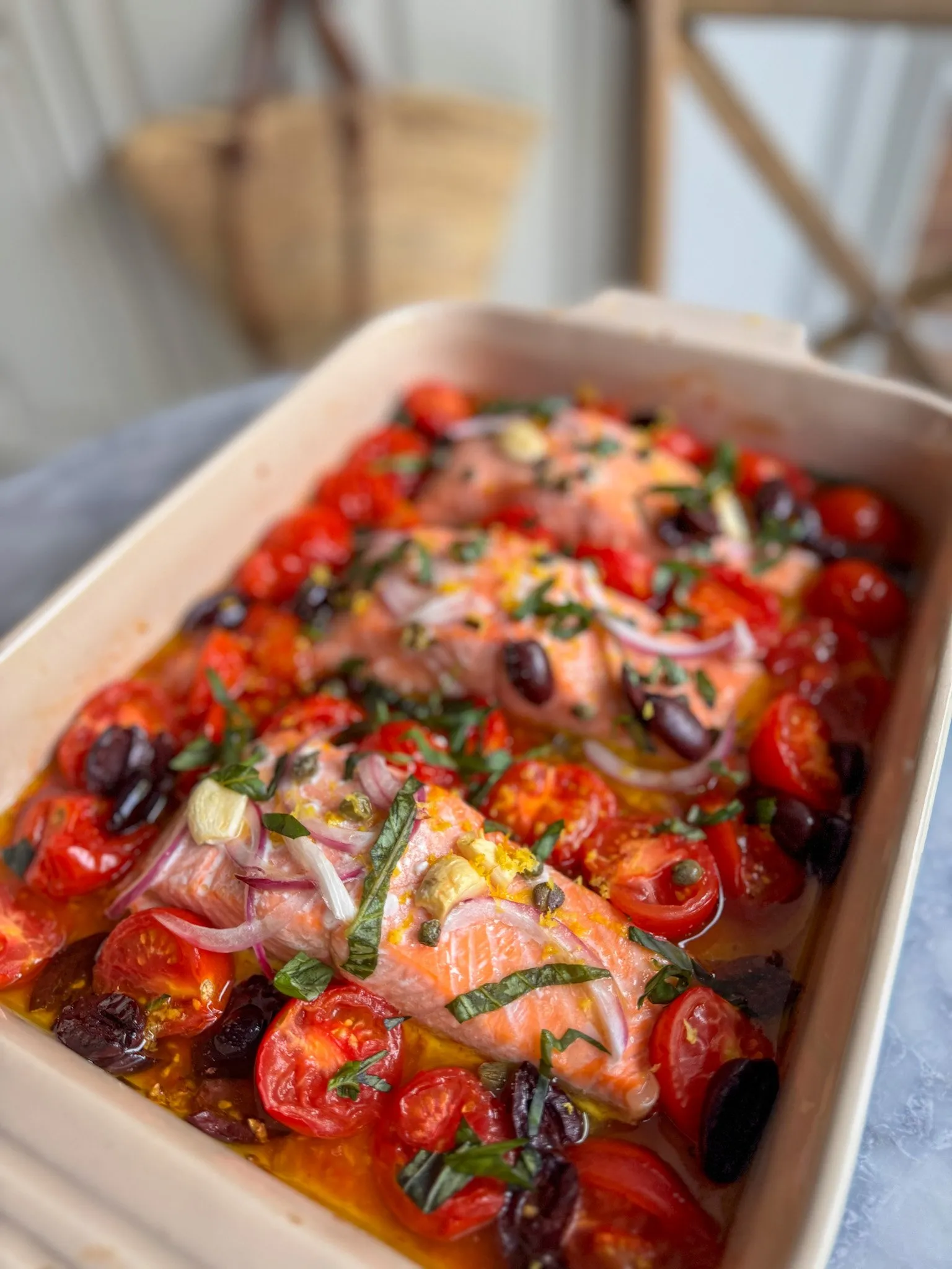 Mediterranean Salmon baked with tomatoes, garlic, basil, olives and capers