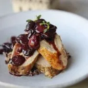 Pork tenderloin with cherry sauce finished dish for serving