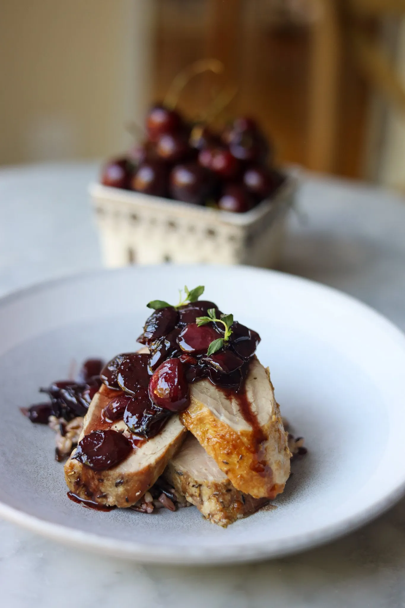 Pork tenderloin with cherry sauce finished dish for serving