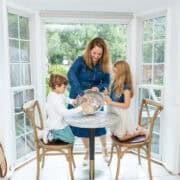 Le Chef's wife family in the kitchen making bread