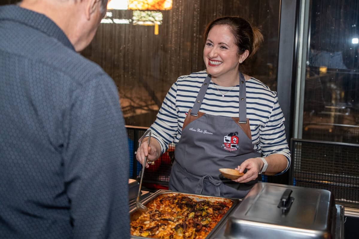 Le chef's wife serving cassoulet at the d'artagnan Cassoulet War