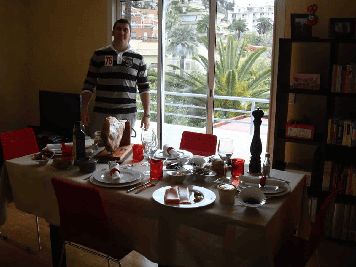 Chef Sebastien at the table in his home in Nice France - ready to welcome guests