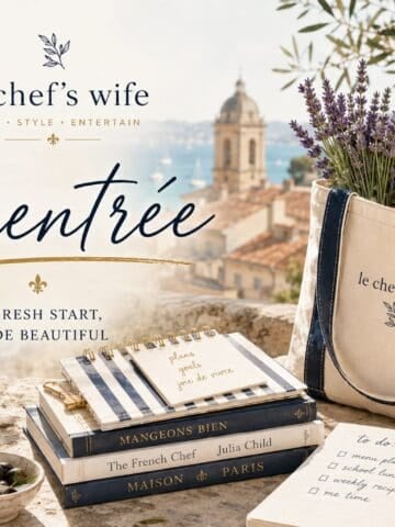 and assortment of articles from the south of france that illustrate la rentree - a canvas tote, lavender, notebooks, coffee and a view over a provencal village